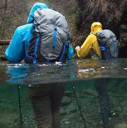 rain camping in a poncho