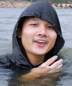 Swimming in hiking poncho